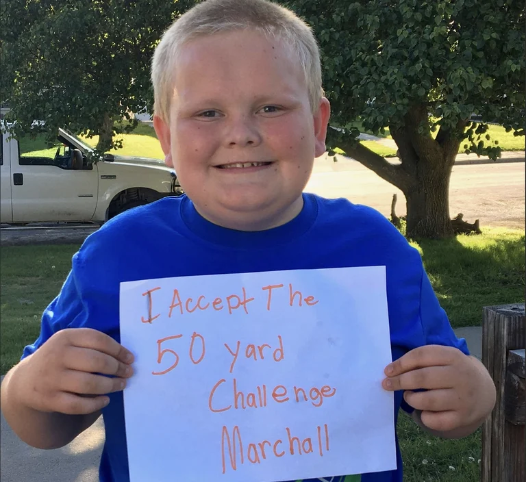 A young participant in the 50 Yard Challenge
