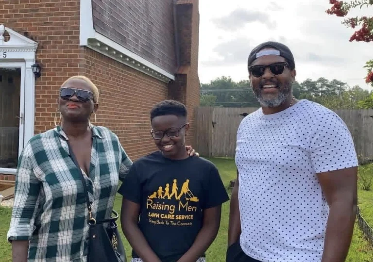 A family participating in the 50 Yard Challenge