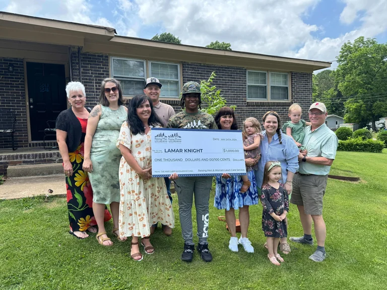 Rodney pictured with a group during a Mary Gibbs Scholarship presentation